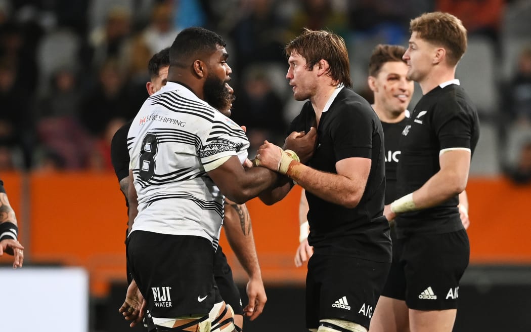 Albert Tuisue (L) and Ethan Blackadder have a scuffle.