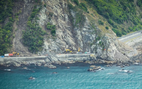 Work being done to clear slips blocking State Highway 1.