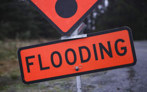 Flood sign near Rakaia Gorge.