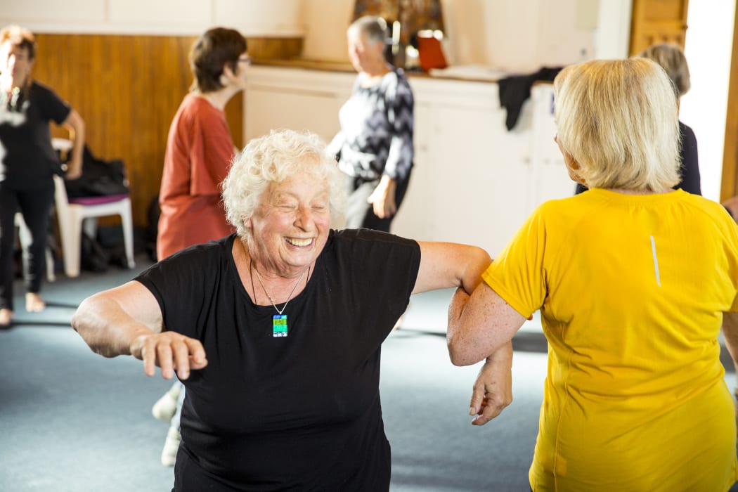 Ruth Busch dancing with her Feisty Feet troupe