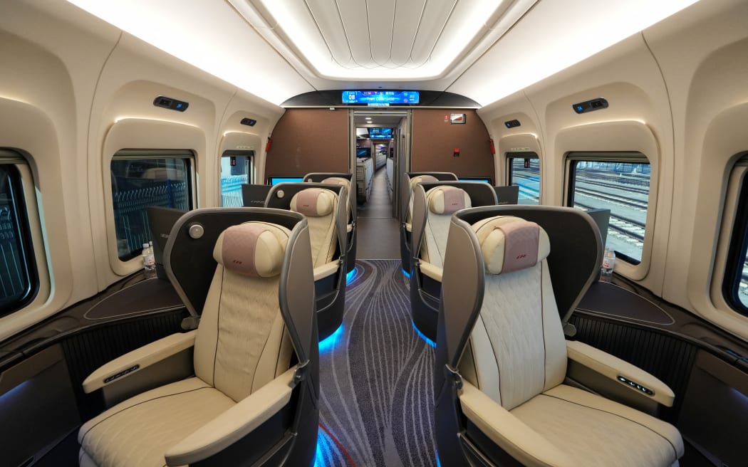 An interior view of a business class carriage of the CR450AF bullet train in Beijing on 29 December 2024.