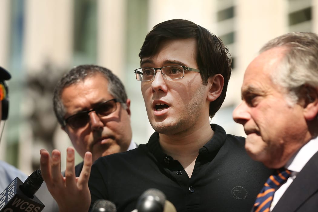 Former pharmaceutical executive Martin Shkreli speaks to the media in front of the US District Court for the Eastern District of New York with members of his legal team after the jury issued a verdict, 4 August 2017.