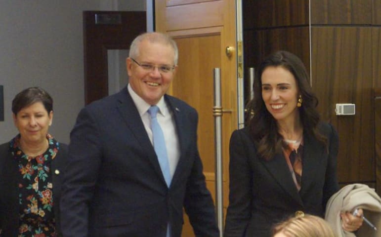 Australian Prime Minister Scott Morrison with New Zealand Prime Minister Jacinda Ardern head into a meeting in July, 2019.
