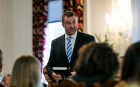 Mark Patterson is sworn in as a government minister, 27 November 2023.