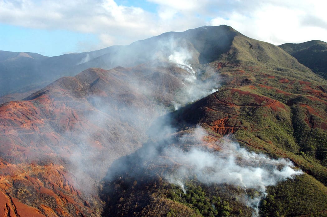 Aerial view of an area devastated by fire near Noumea, in New Caledonia, 28 December 2005.