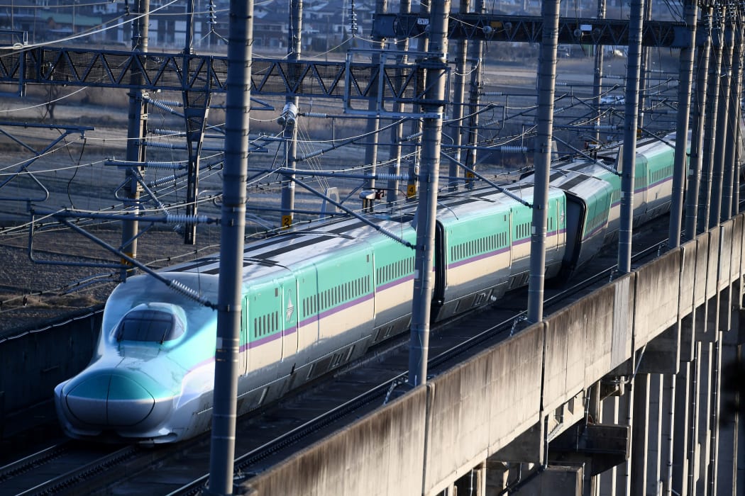 A Shinkansen bullet train derailed in Shiroishi, Miyagi prefecture after a 7.3-magnitude quake jolted northeast Japan.