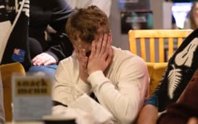New Zealand fans react as they watch New Zealand All Whites vs Costa Rica at a World Cup qualifying match played in Qatar.  2022.