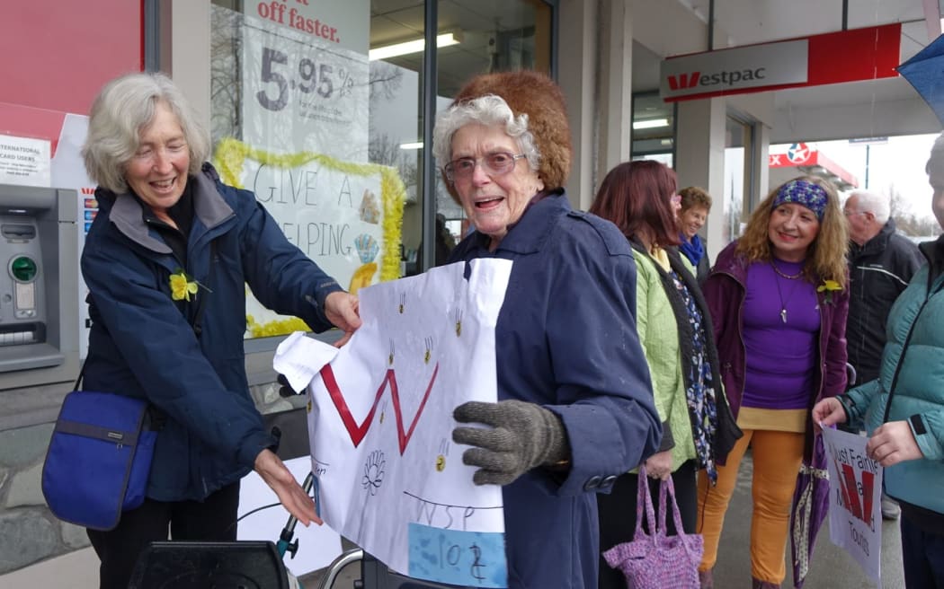 Protests are taking place as Westpac considers closing 19 branches across the country.