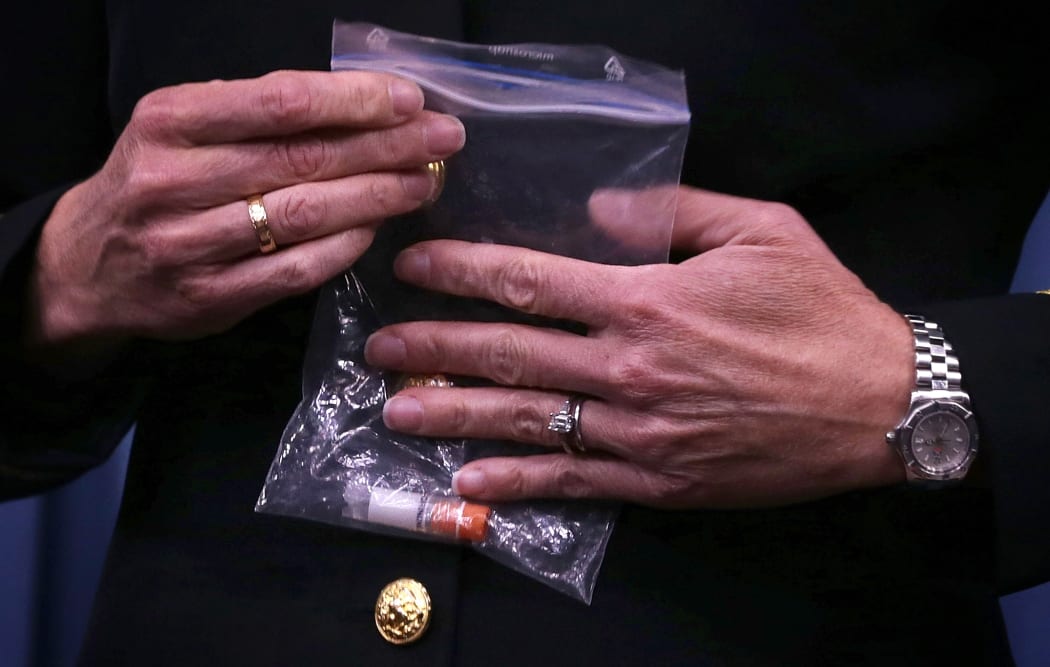 Franca Jones holding an anthrax sample.