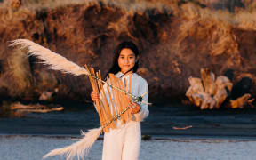 girl with homemade kite