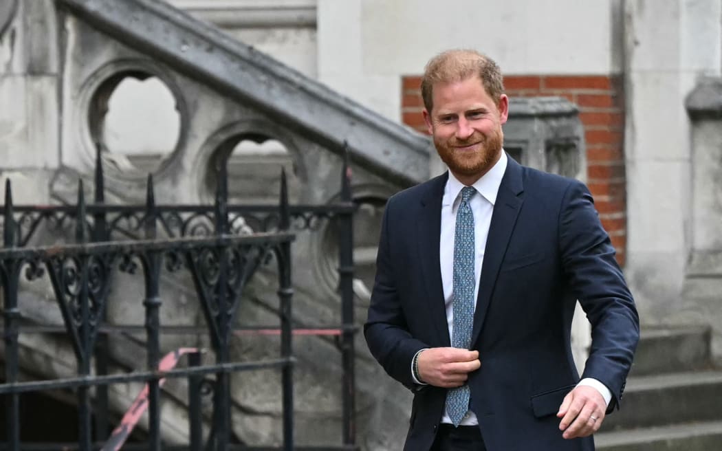 (FILES) Britain's Prince Harry, Duke of Sussex leaves the High Court, in central London, on April 8, 2025 after an hearing about a decision of the British Government to downgrade his personal security during visits in Britain. Prince Harry is to return to London this week for the trial into his claims that a UK newspaper group unlawfully gathered information, in the royal's last case in his long-running crusade against the media. (Photo by JUSTIN TALLIS / AFP)