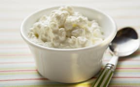 Cottage cheese in a small bowl (Photo by Foodcollection GesmbH / foodcollection / foodcollection via AFP)