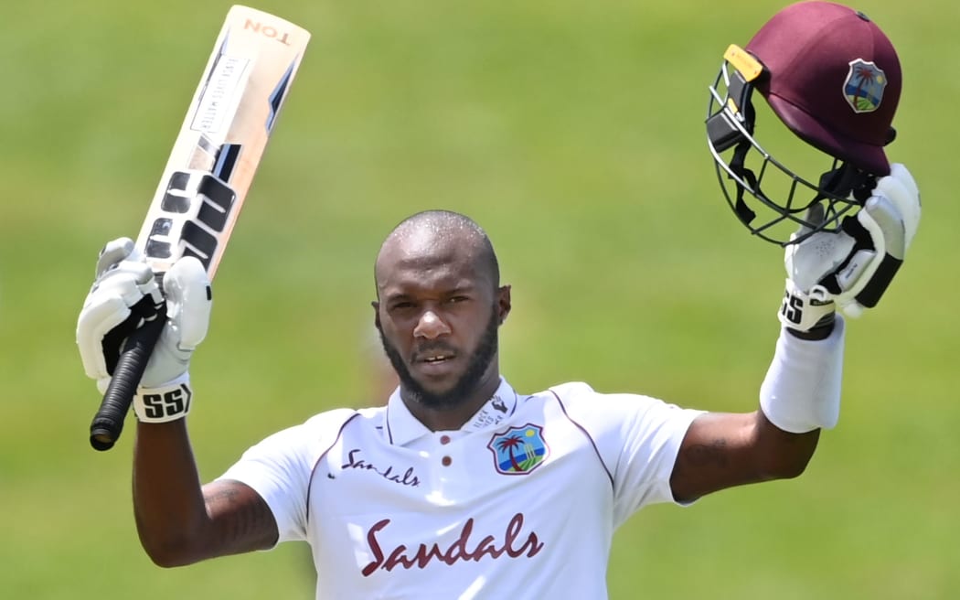 West Indies batsman Jermaine Blackwood celebrates his century.