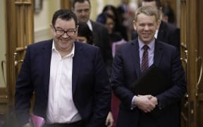 Grant Robertson and Chris Hipkins walk to Labour's caucus