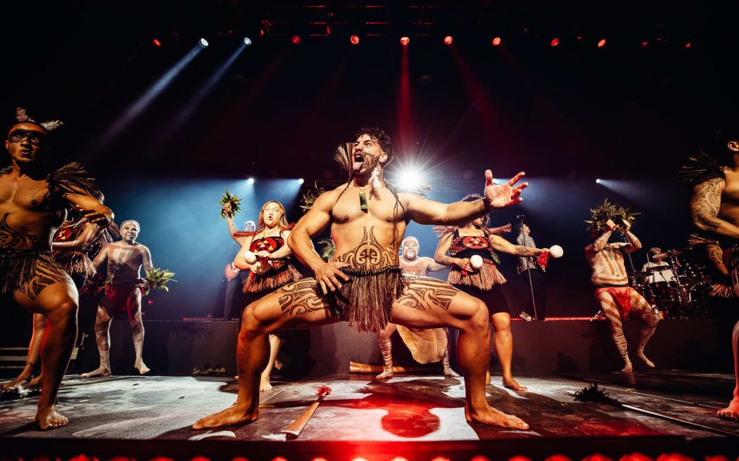 A Māori kapa haka group performs as part of Six60's show.