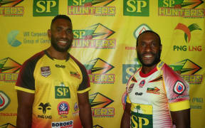 PNG Hunters captain Adex Wera (R) and vice-captain Moses Meninga (L).