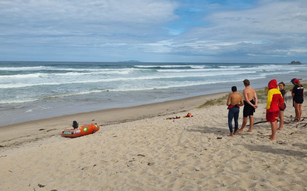 Surf Lifesaving crews at Opoutere Beach after a group of seven people signalled for help.