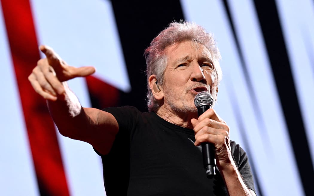 21 May 2023, Bavaria, Munich: Pink Floyd co-founder Roger Waters performs at the Olympiahalle as part of his "This Is Not A Drill" tour of Germany. The concert is controversial. Previously, local politicians had demanded that the performance be canceled because of accusations of anti-Semitism against Waters. Photo: Angelika Warmuth/dpa (Photo by ANGELIKA WARMUTH / DPA / dpa Picture-Alliance via AFP)