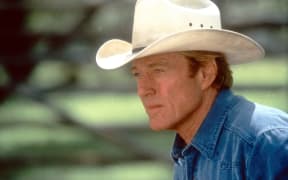 The Horse Whisperer 
Year : 1998 USA
Director : Robert Redford
Robert Redford
Photo: Elliott Marks.
It is forbidden to reproduce the photograph out of context of the promotion of the film. It must be credited to the Film Company and/or the photographer assigned by or authorized by/allowed on the set by the Film Company. Restricted to Editorial Use. Photo12 does not grant publicity rights of the persons represented. (Photo by Touchstone Pictures / Archives du 7eme Art / Photo12 via AFP)
