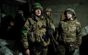 Ukrainian servicemen of the State Border Guard Service at a shelter in Bakhmut on February 16, 2023.