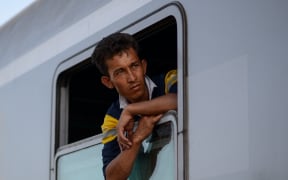 Croatia is transporting refugees to Hungary after reversing its one-door policy.