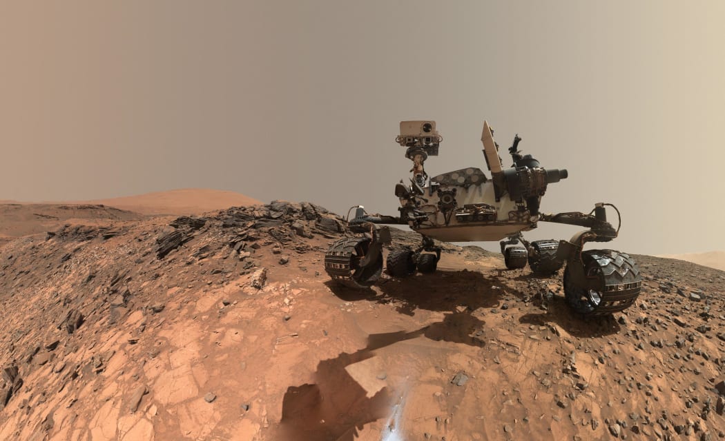 This NASA photo released June 7, 2018 shows a low-angle self-portrait of NASA's Curiosity Mars rover vehicle at the site from which it reached down to drill into a rock target called "Buckskin" on lower Mount Sharp.