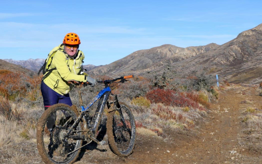 Mark Inglis and his electric mountian bike on the St James trail.