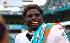 MIAMI GARDENS, FLORIDA - SEPTEMBER 08: Tyreek Hill #10 of the Miami Dolphins reacts after his team's 20-17 win against the Jacksonville Jaguars at Hard Rock Stadium on September 08, 2024 in Miami Gardens, Florida.   Megan Briggs/Getty Images/AFP (Photo by Megan Briggs / GETTY IMAGES NORTH AMERICA / Getty Images via AFP)