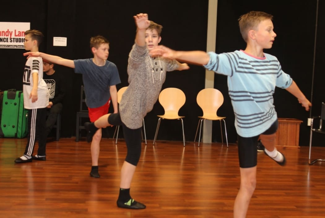 An image of Christian Swan, Daniel Bridgman, Stanley Reedy and Harry Sills dancing in ballet class.