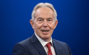 Former British prime minister Tony Blair speaks at a session during the World Economic Forum (WEF) annual meeting in Davos on January 22, 2025. (Photo by FABRICE COFFRINI / AFP)