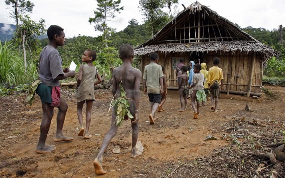 Children of the Andai tribe attend the single-room Lutheran school in Kaiam village in the remote East Sepik province of Papua New Guinea, 05 July 2007.