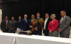 Taku Parai, left, Mathew Solomon, Jill Day, Kevin Lavery, Paul Eagle, Justin Lester, Wayne Mulligan, Hannah Buchanan, Jason Fox at the signing of the MoU.