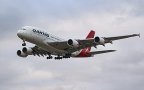 Qantas Airbus A380 aircraft as seen flying and landing at London Heathrow Airport LHR. The wide body double-decker Airbus A380 aircraft has the registration VH-OQH, the name Reginald Ansett and is powered by 4x Rolls Royce RR jet engines. The specific passenger plane was stored for 2 years due to the Covid-19 Coronavirus pandemic. Qantas Airways Limited is the flag carrier of Australia, the world's third oldest airline in operation and member of Oneworld aviation alliance group. The main hub for the Australian airline is Sydney airport. London, United Kingdom on August 2022 (Photo by Nicolas Economou/NurPhoto) (Photo by Nicolas Economou / NurPhoto / NurPhoto via AFP)