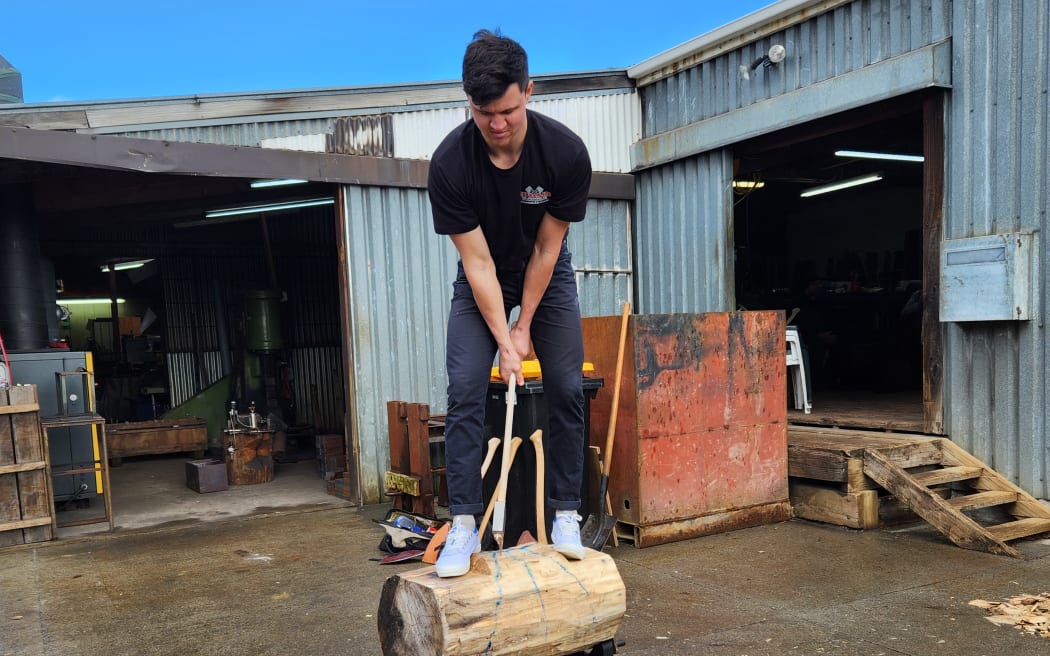 Quintin Fawcett demonstrates his woodchopping skills
