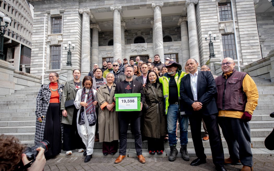 Rueben Taipari deliver sign petitions to parliament