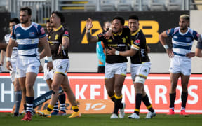 Wellington winger Pepesana Patafilo celebrates with Ardie Savea after scoring during the Mitre 10 Cup rugby match between Auckland and Wellington, held at Eden Park, Auckland, New Zealand.  20  September  2020