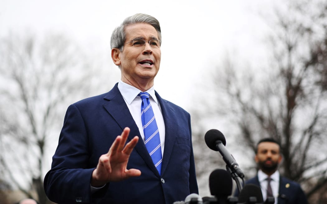 US Treasury Secretary Scott Bessent speaks to reporters outside the West Wing of the White House.