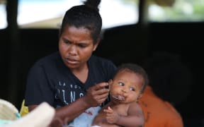 This camp's women leaders said fleeing the volcano and the ardous ocean journey to Santo was a traumatic experience.