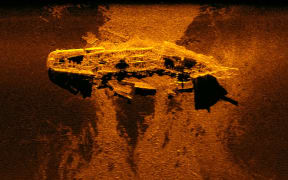 This sonar image was released by the Australian Transport Safety Bureau and shows a ship wreckage on the ocean bed.