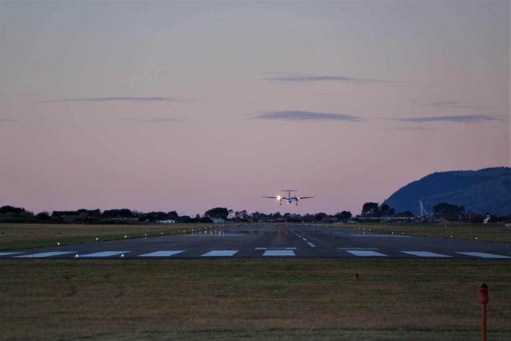 Air NZ Q300 landing Nelson Airport, from where the company is shifting its heavy maintenance base.