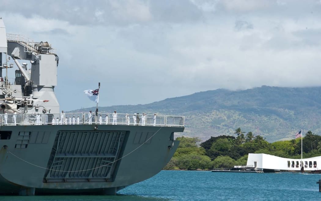 The Canterbury passing the USS Arizona Memorial.
