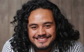 Headshot of baritone Samson Setu