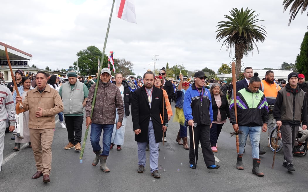 Community leaders front the hīkoi as it makes its way down Broadway.