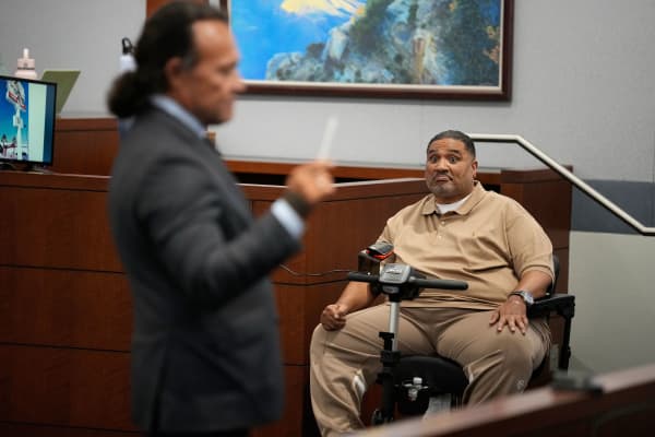 Reginald Lilburn Wright Jr. testifies at Clark County District Court Regional Justice Center in Las Vegas on Tuesday. John Locher/Pool/AP