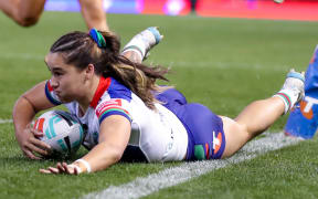 Payton Takimoana dives in to score. Newcastle Knights v One NZ Warriors.