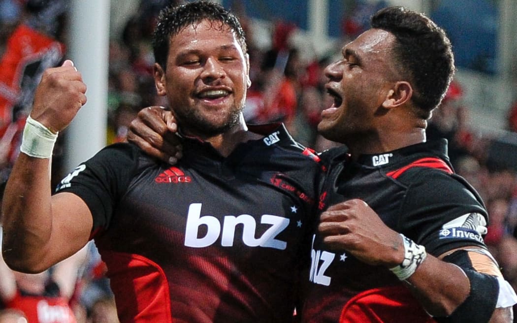Whetu Douglas celebrates his try with Seta Tamanivalu.