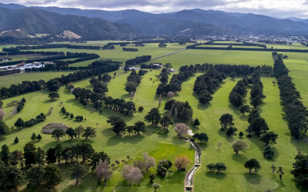 Featherston Golf Club, as shown in marketing images by Property Brokers.