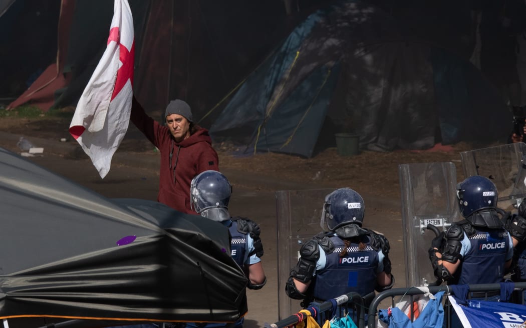 Defiance from a man refusing police demands to leave the lawns on parliament. 2 March, 2022.
