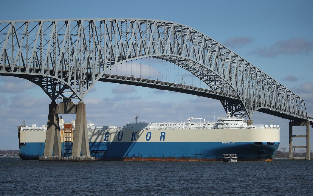 BALTIMORE, MD - MARCH 09: An outbound cargo ship passes under the Francis Scott Key Bridge, March 9, 2018 in Baltimore, Maryland. U.S. President Donald Trump announced that he will impose tariffs of 25 percent on imported steel and 10 percent on imported aluminum with an initial exemption for Mexico and Canada.   Mark Wilson/Getty Images/AFP (Photo by MARK WILSON / GETTY IMAGES NORTH AMERICA / Getty Images via AFP)