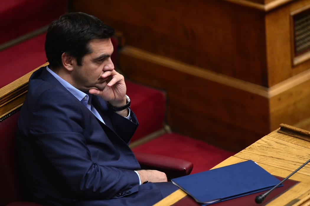 Greek Prime Minister Alexis Tsipras listens to speakers in Parliament on 23 July 2015.